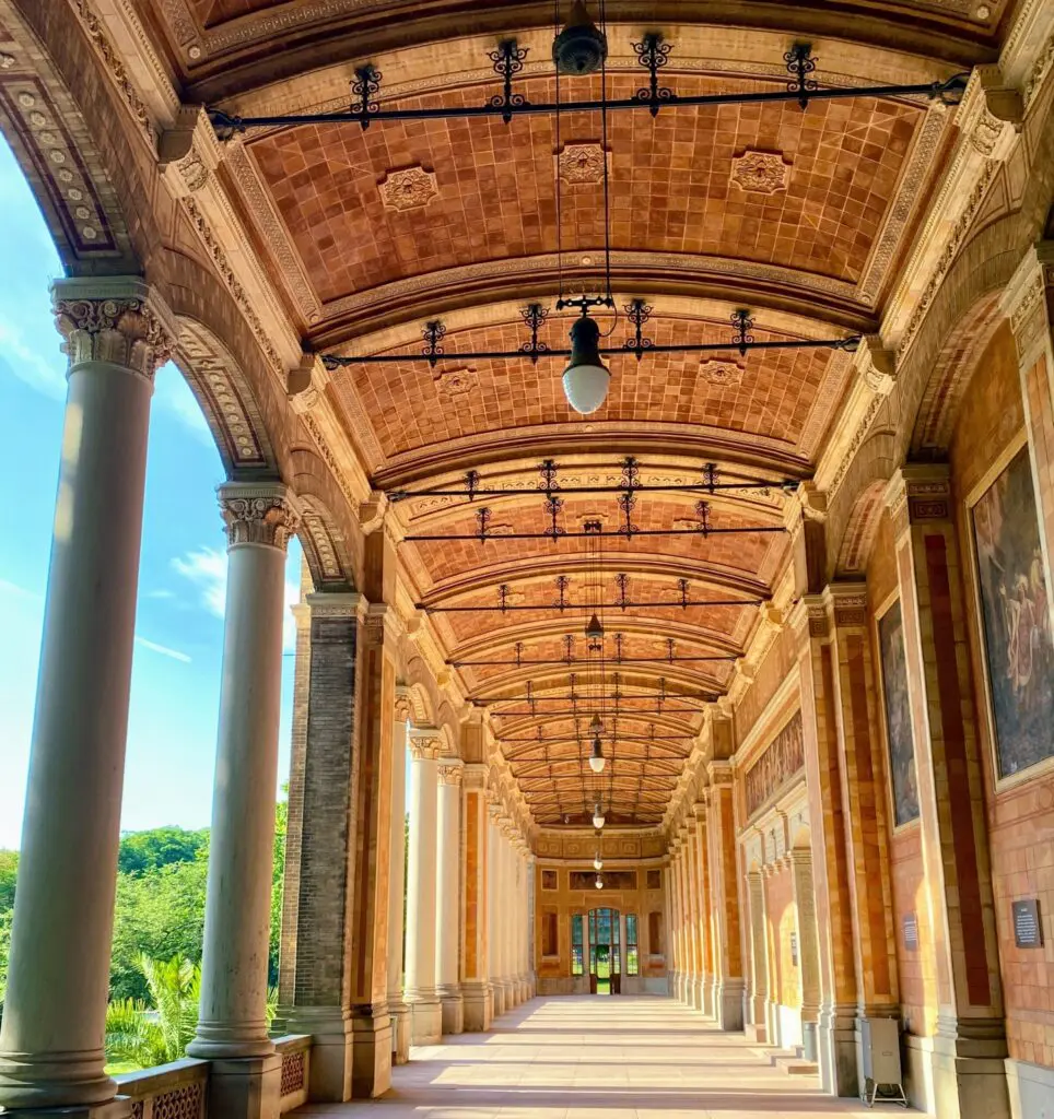 Historic colonnade symbolizing consistency and standards in Quality Assurance Management